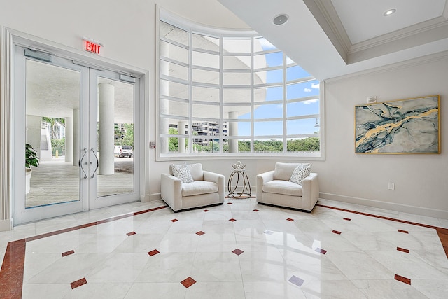 unfurnished room with french doors, ornamental molding, recessed lighting, and baseboards