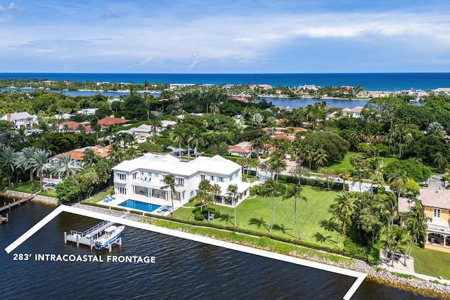 birds eye view of property featuring a water view