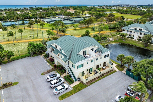 birds eye view of property featuring a water view