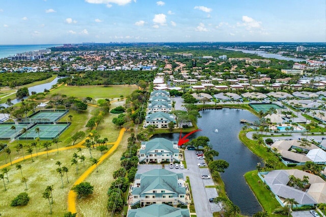 drone / aerial view with a water view