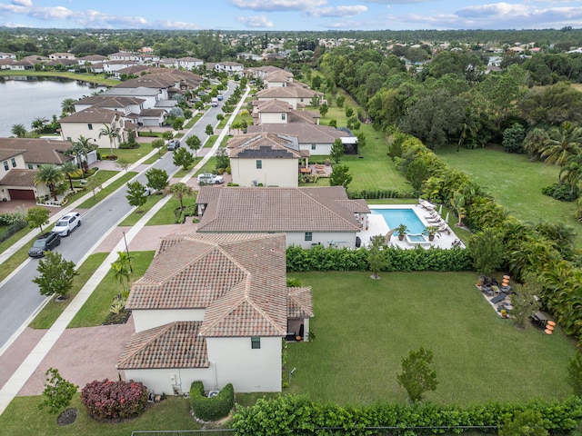 drone / aerial view with a water view