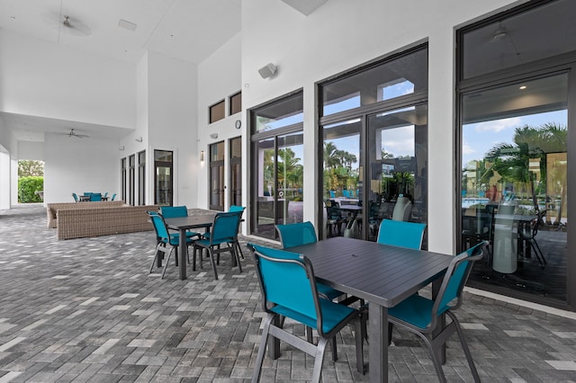 view of patio / terrace with an outdoor living space and ceiling fan