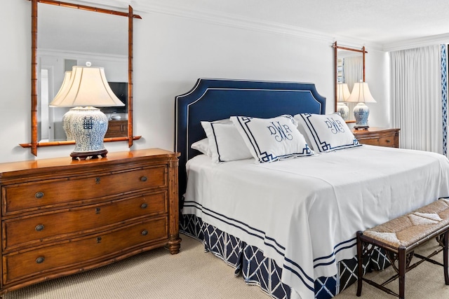 carpeted bedroom featuring ornamental molding