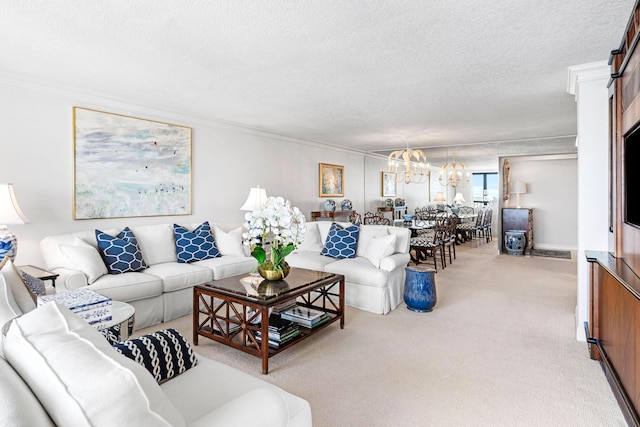 carpeted living room featuring an inviting chandelier, a textured ceiling, and ornamental molding