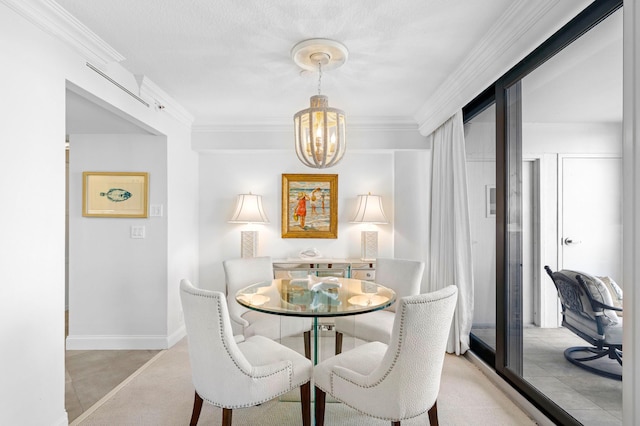 dining area with an inviting chandelier, light colored carpet, a textured ceiling, and ornamental molding