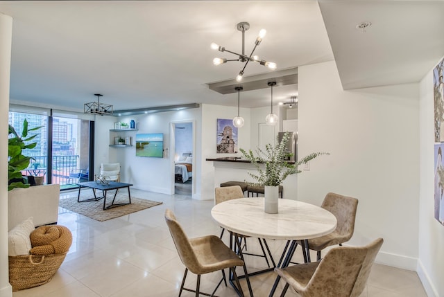 dining area featuring light tile patterned floors and a notable chandelier