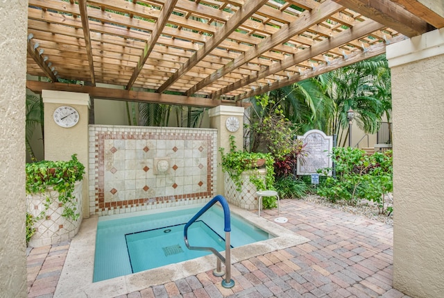 view of swimming pool with a community hot tub and a pergola