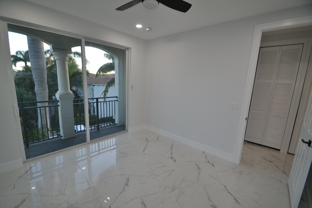 spare room featuring ceiling fan