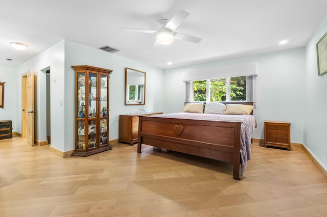 bedroom featuring ceiling fan and light hardwood / wood-style floors