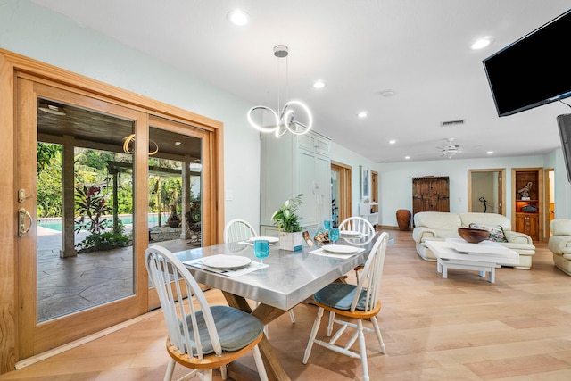 dining space featuring light wood-style floors, visible vents, a ceiling fan, and recessed lighting