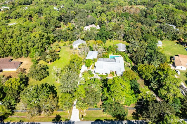 aerial view featuring a view of trees