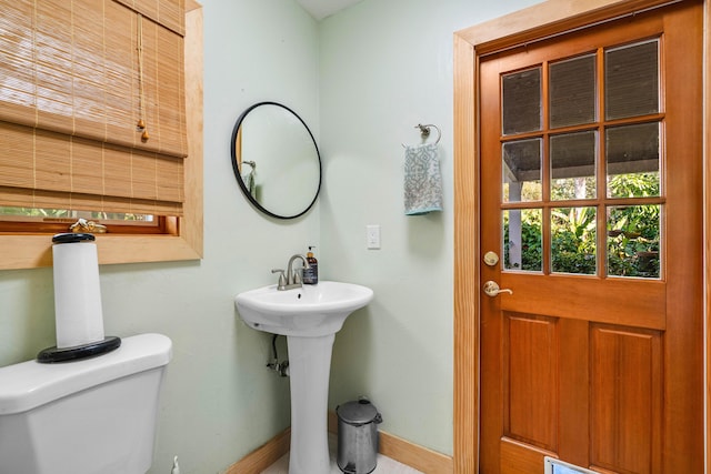 bathroom featuring sink and toilet