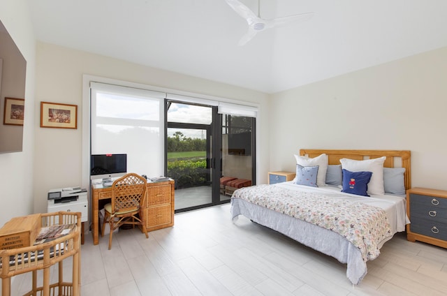 bedroom with access to exterior, light hardwood / wood-style flooring, and ceiling fan