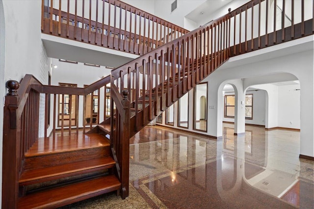 stairway with a high ceiling