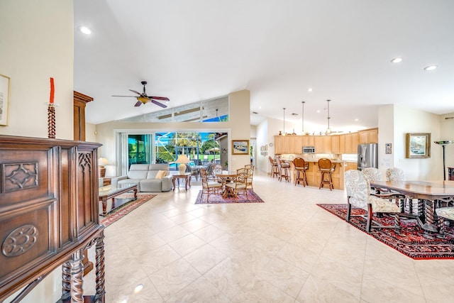 living room with vaulted ceiling and ceiling fan