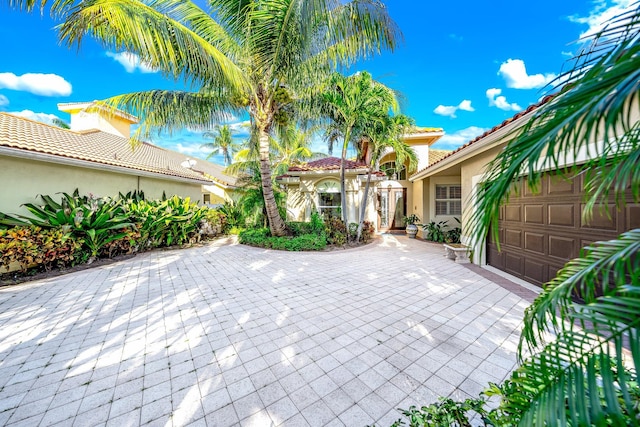 view of patio / terrace featuring a garage