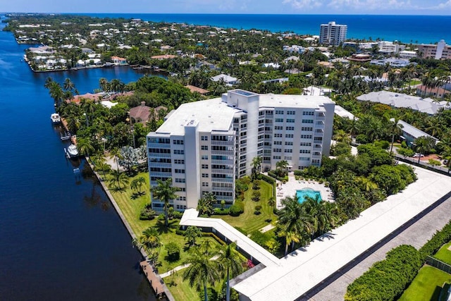 birds eye view of property featuring a water view