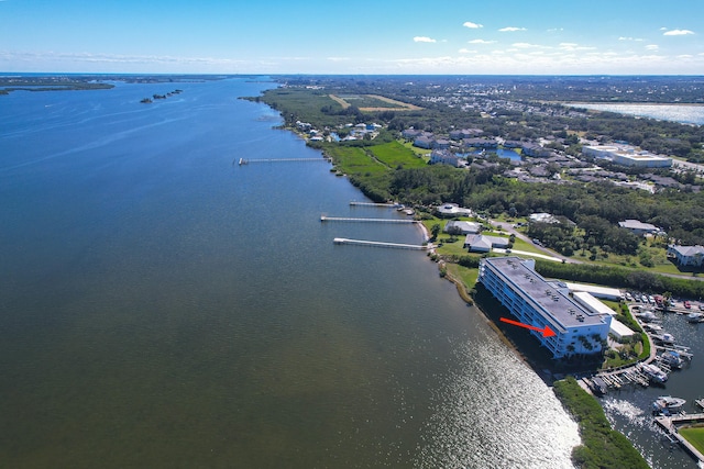 birds eye view of property featuring a water view