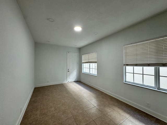 view of tiled spare room