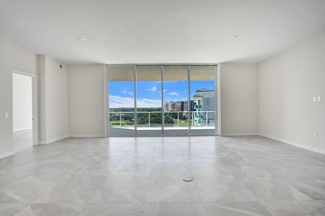 unfurnished living room with recessed lighting