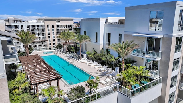 community pool with a patio area