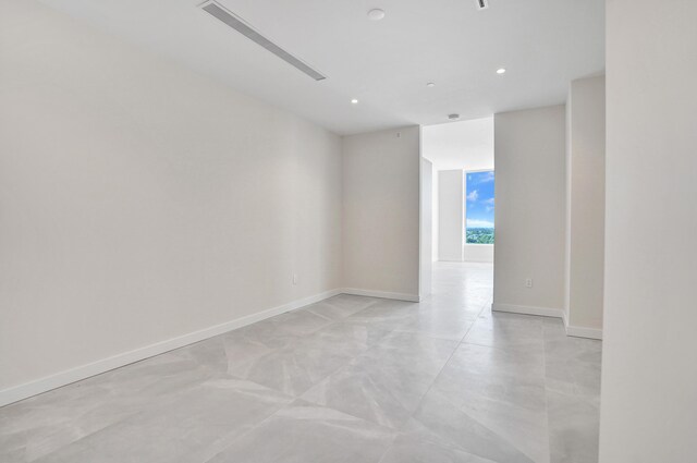 full bathroom with a soaking tub, a marble finish shower, and baseboards