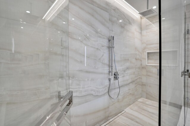 bathroom featuring baseboards and toilet