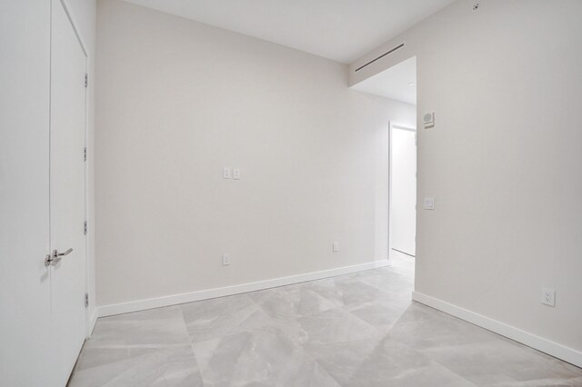 laundry room with washer and dryer, laundry area, a sink, and marble finish floor