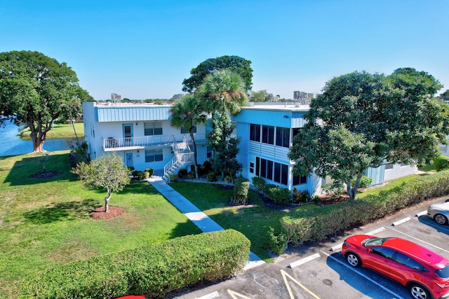 view of front of property with a front lawn