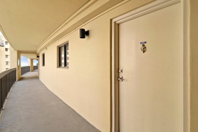 entrance to property featuring a balcony