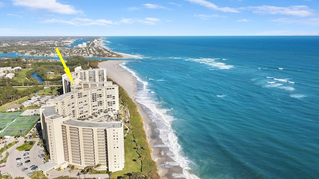 aerial view with a view of the beach and a water view