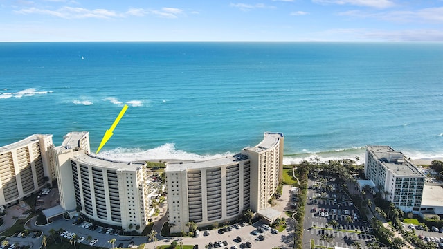 aerial view featuring a water view and a view of the beach