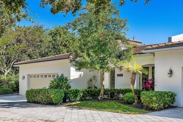 view of front of property with a garage