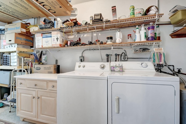 washroom with washer and dryer