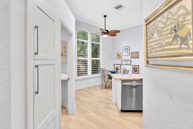 office area featuring ceiling fan and ornamental molding