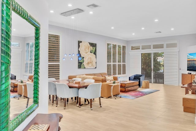 living room with ornamental molding