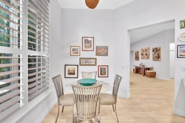 dining area featuring ornamental molding