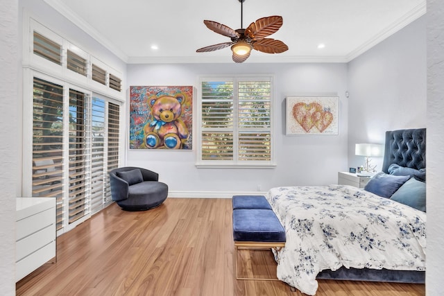 bedroom with ceiling fan, light wood-type flooring, and ornamental molding