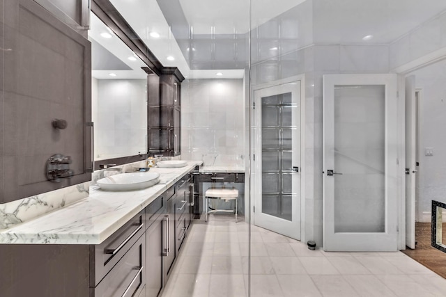 bathroom featuring vanity and hardwood / wood-style flooring