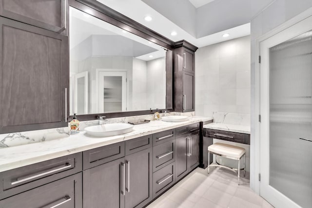 bathroom with vanity and tile patterned floors