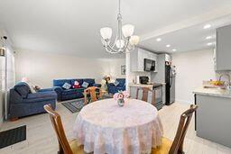 dining area featuring a chandelier