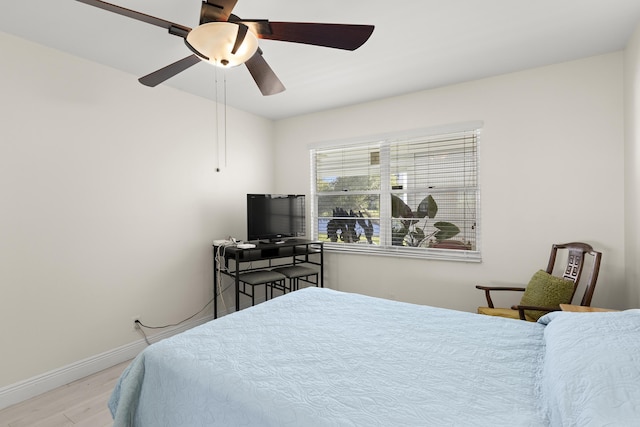 bedroom featuring light hardwood / wood-style flooring and ceiling fan