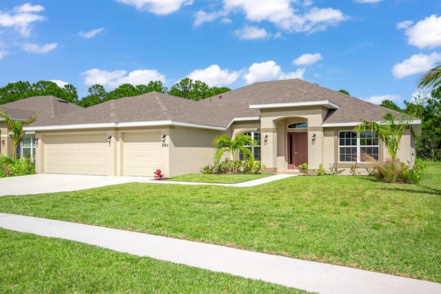 view of front facade with a front lawn and a garage