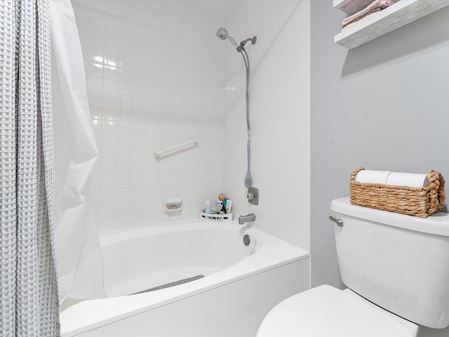 bathroom with toilet and shower / bath combo with shower curtain