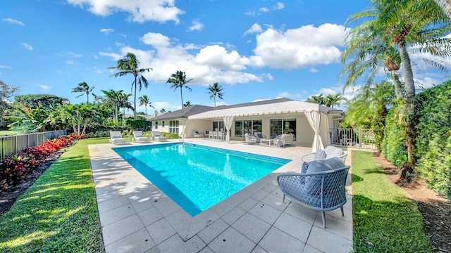 view of swimming pool featuring a patio