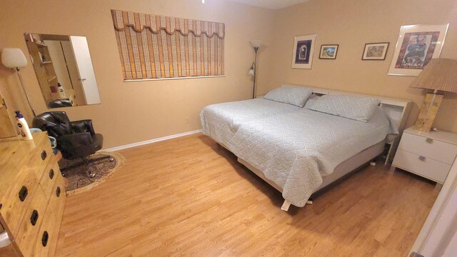 bedroom featuring light hardwood / wood-style flooring