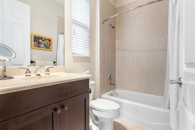 full bathroom featuring vanity, shower / bath combo, and toilet