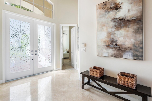 foyer entrance featuring french doors