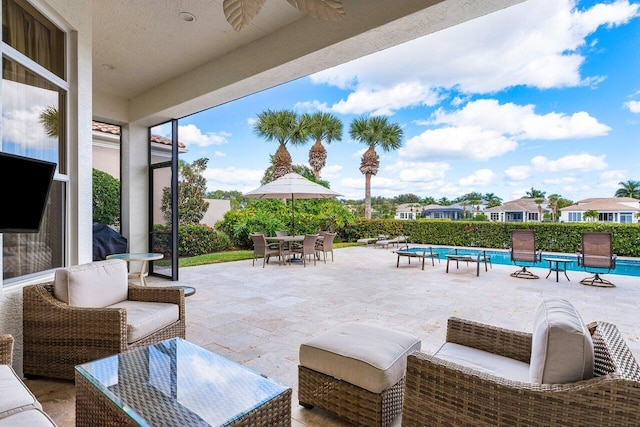 view of patio featuring a fenced in pool