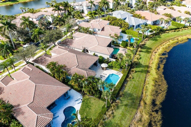 drone / aerial view with a water view